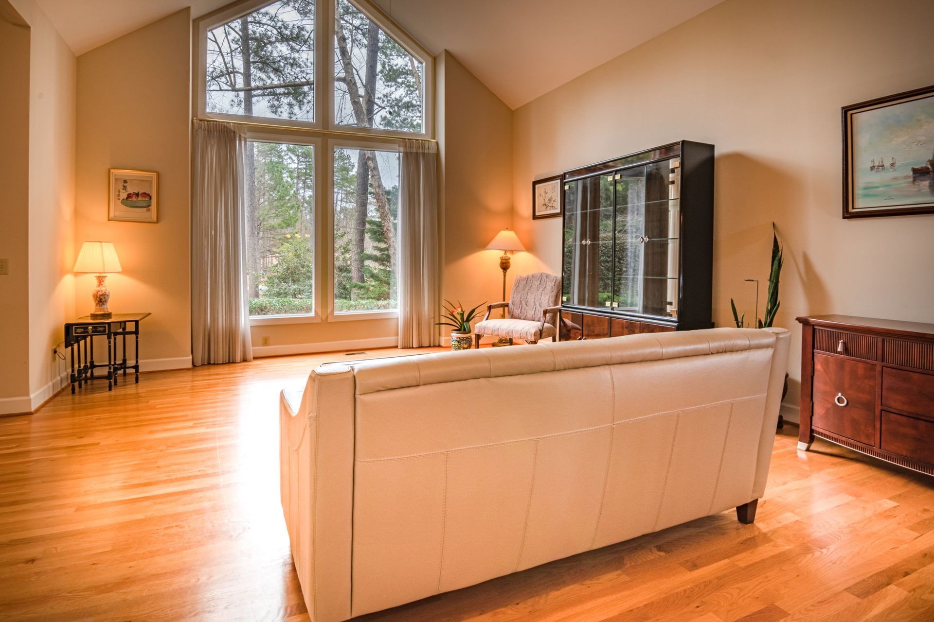 a residential living room with newly installed waterproof engineered wood flooring.