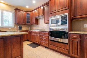 A newly remodeled kitchen featuring tile floors.